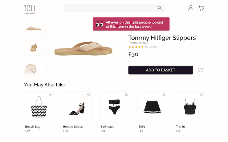 Product detail page for a pair of slippers with a social proof pop-up that says, “All eyes on this! 435 people looked at this item in the last week!”.