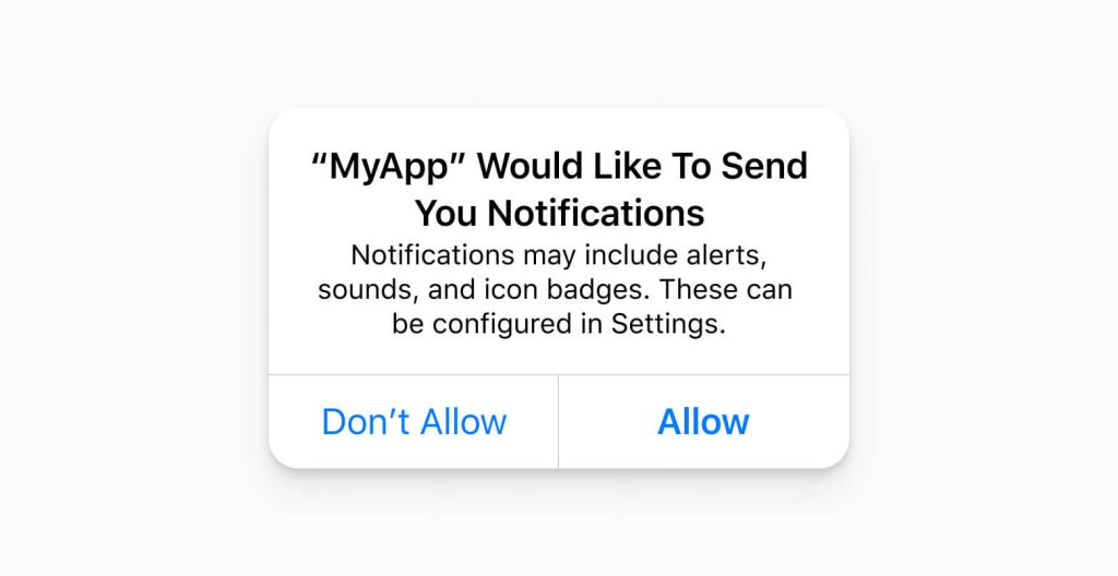 The default iOS push notification permission message that reads “MyApp” would like to send you notifications. Notifications may include alerts, sounds, and icon badges. These can be configured in Settings. Choice buttons are “Don’t Allow” and “Allow”.
